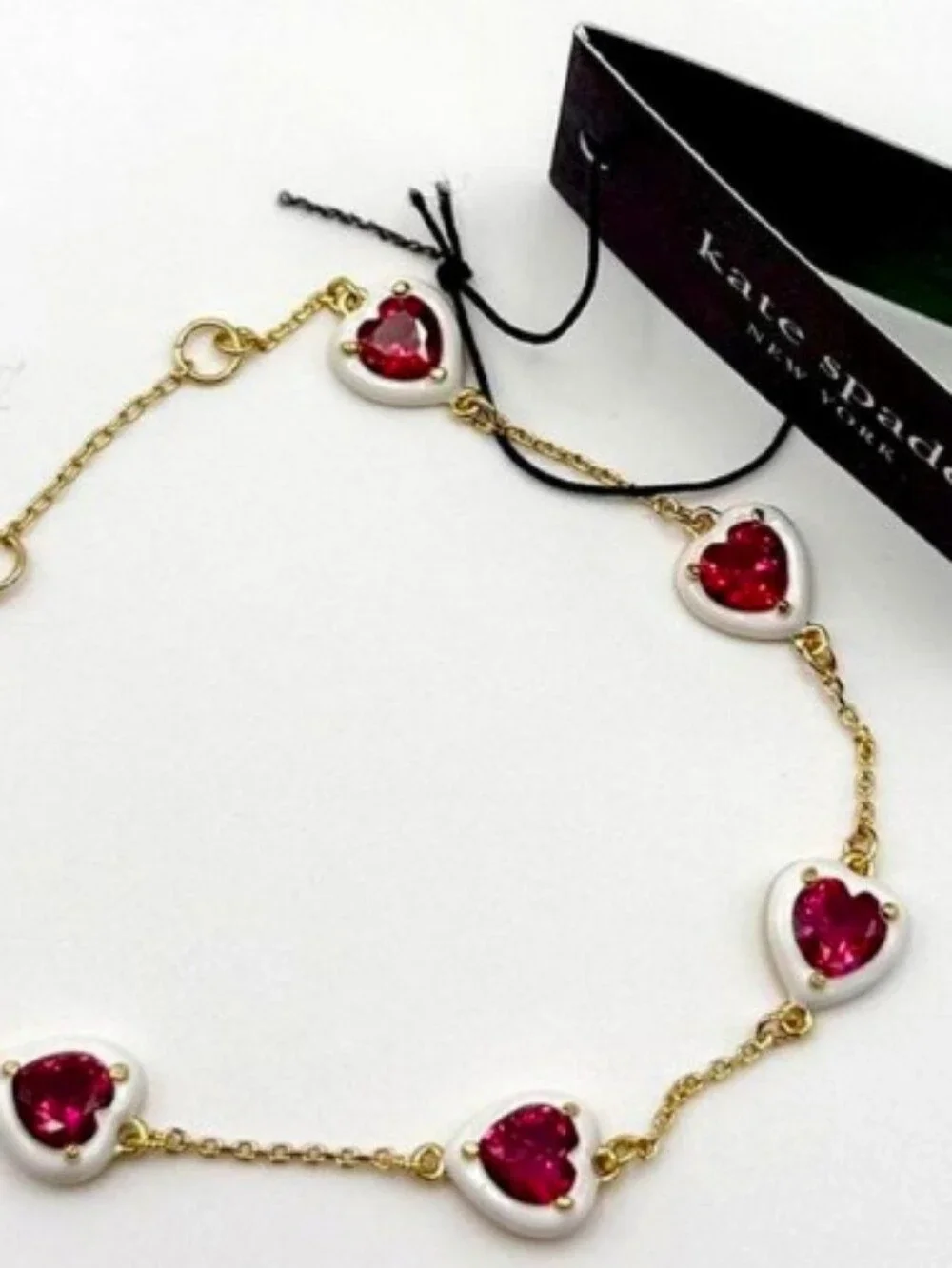 kate spade Sweetheart gold-plated Bracelet with red heart stones and white frame - Picture 1 of 3